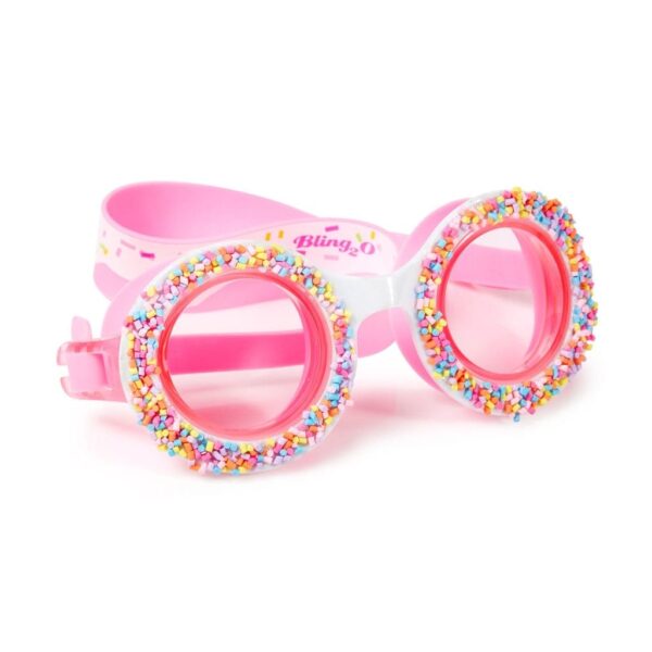 Kleurrijke zwembril met snoepjes en donuts.