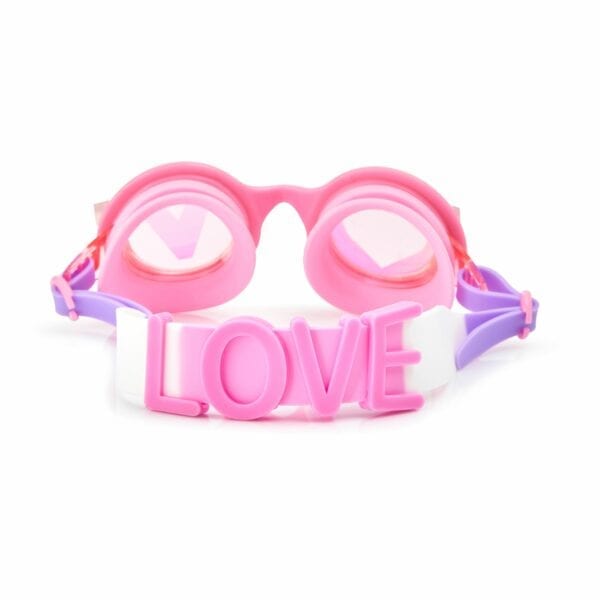 Bling2o zwembril. Heeft een ronde roze montuur. Als je naar de voorkant kijkt lees je love. De O is een hartje in het linker glas en lees je de letter v in het rechter glas. Heeft een latex bandje waarop de achterkant LOVE staat.